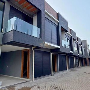 Geminado com 106m², 3 dormitórios, 1 suíte, 1 vaga no bairro Praia da Cal em Torres para Comprar