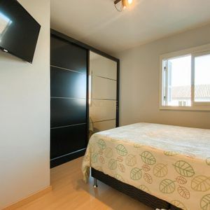 Sobrado com 54m², 2 dormitórios, 1 vaga no Residencial Bela Vista em Torres para Comprar