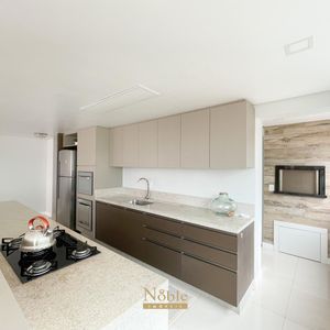 Apartamento com 124m², 3 dormitórios, 3 suítes, 2 vagas no Lê Classic em Torres para Comprar