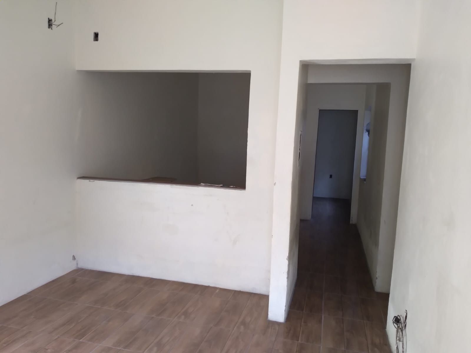 Casa com 2 dorm.  de  alvenaria em região arborizanada.