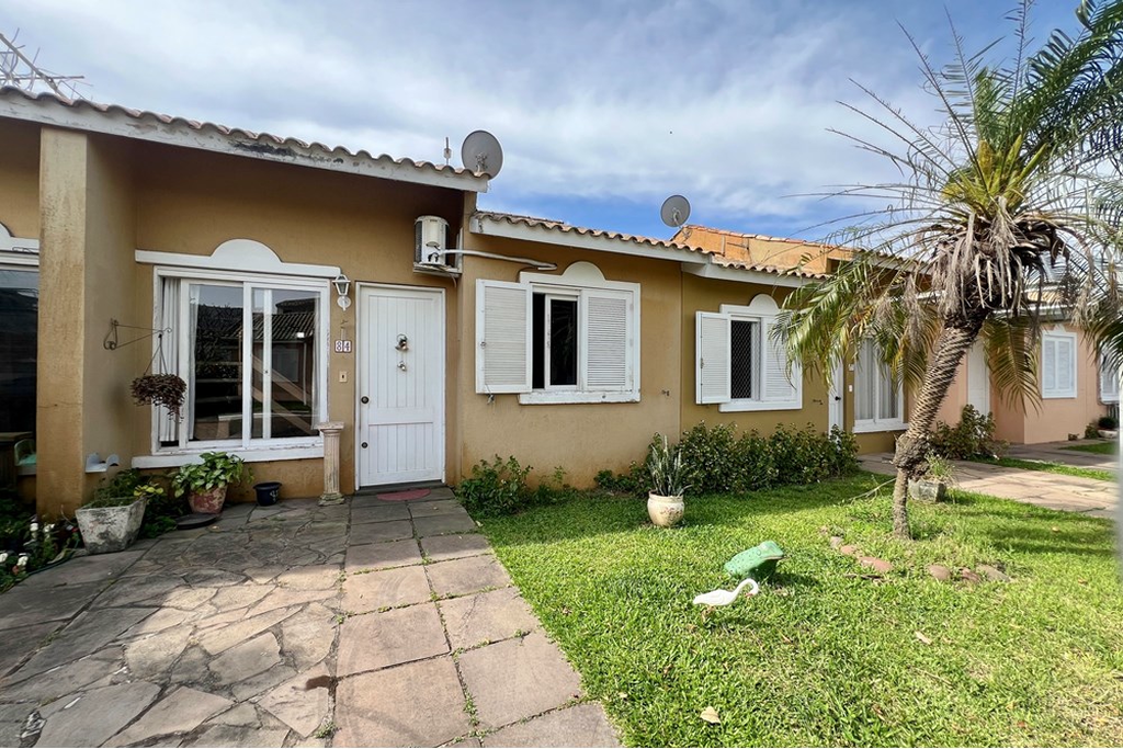 Casa de Condomínio com 79m², 2 dormitórios no bairro Rio Branco em Canoas para Comprar