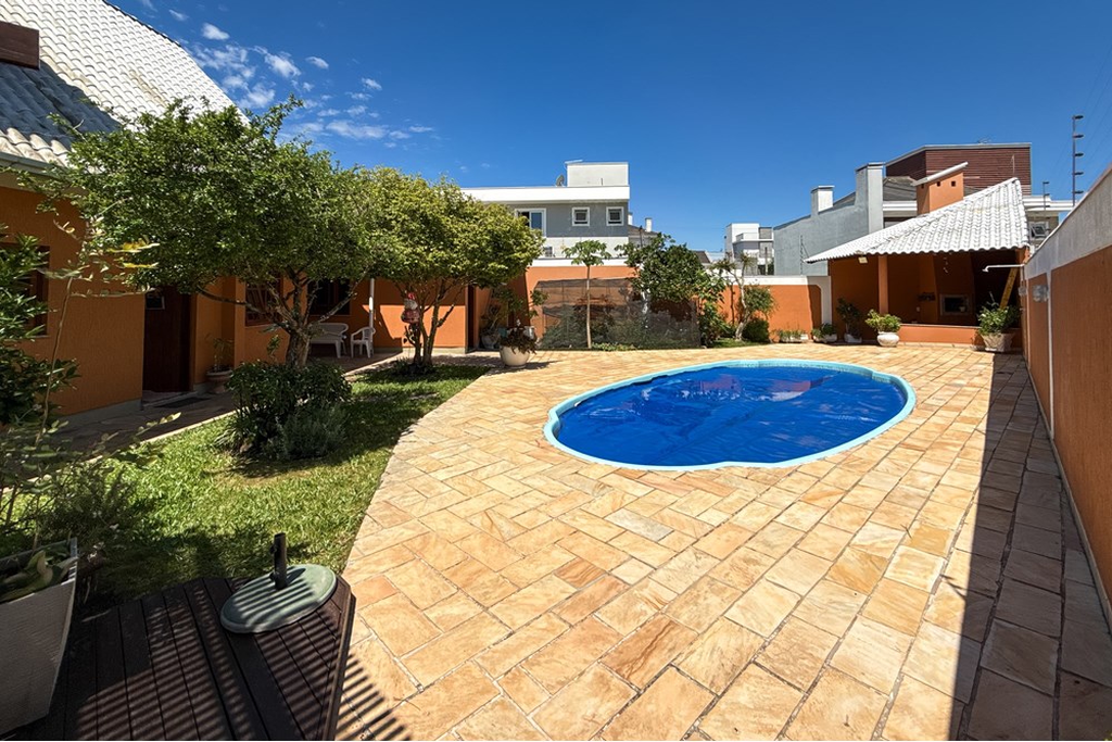 Casa com 410m², 6 dormitórios no bairro Marechal Rondon em Canoas para Comprar