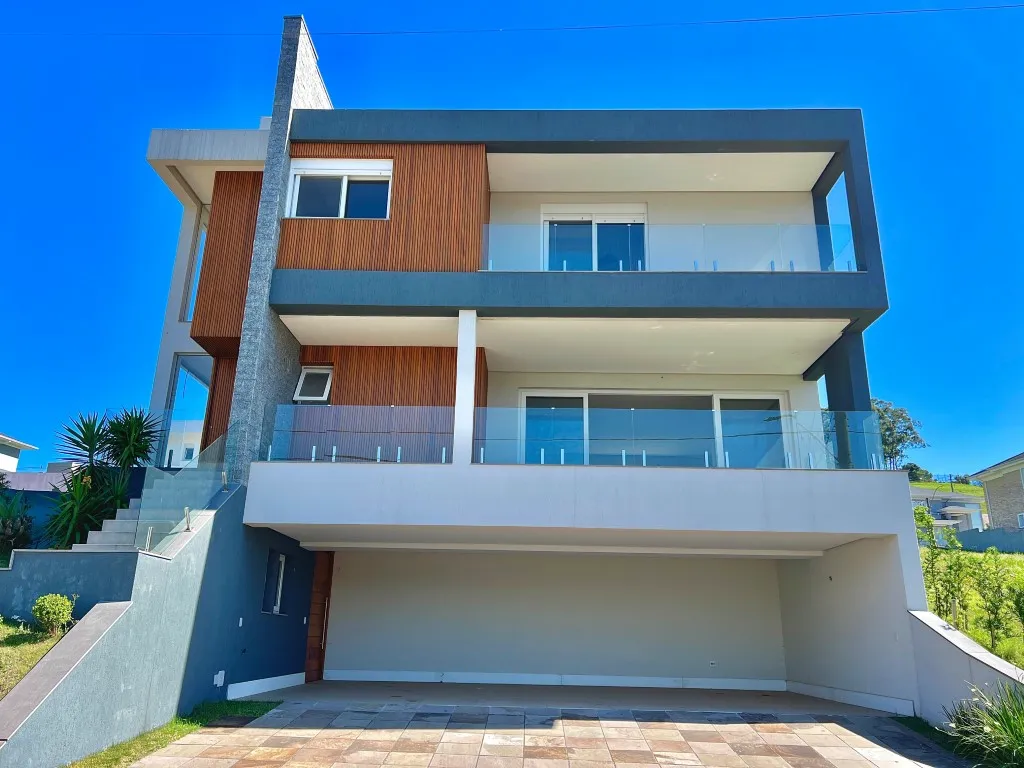 Casa de Condomínio com 375m², 4 dormitórios no bairro Vila Nova em Porto Alegre para Comprar