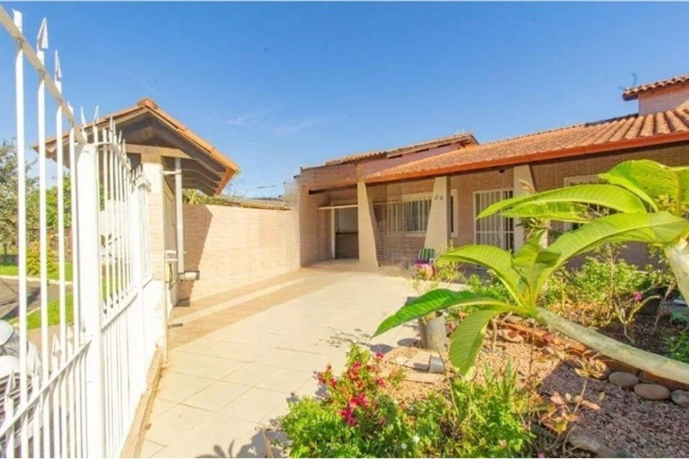 Casa com 172m², 4 dormitórios no bairro Estância Velha em Canoas para Comprar