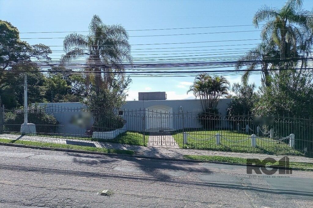 Casa com 580m², 3 dormitórios no bairro Santa Tereza em Porto Alegre para Comprar