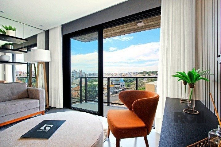 Apartamento com 60m², 2 dormitórios no bairro Menino Deus em Porto Alegre para Comprar