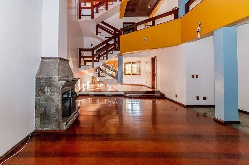 Casa com 500m², 5 dormitórios no bairro Jardim Itu em Porto Alegre para Comprar