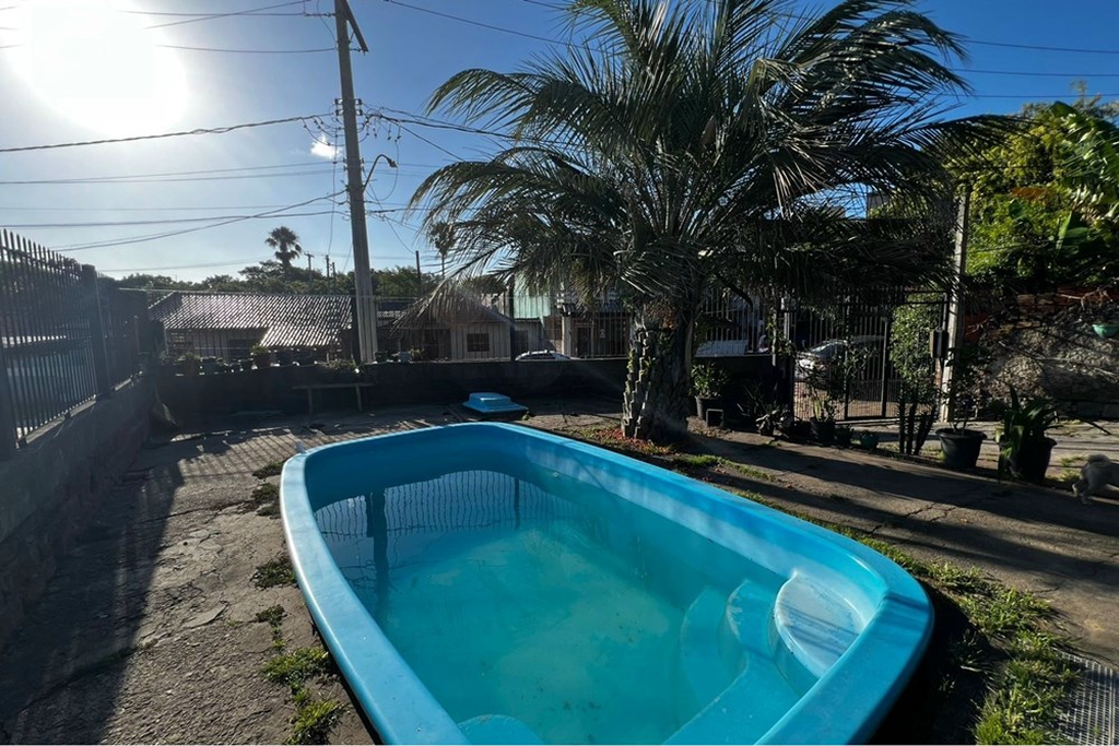 Casa com 125m², 3 dormitórios no bairro Jardim Carvalho em Porto Alegre para Comprar