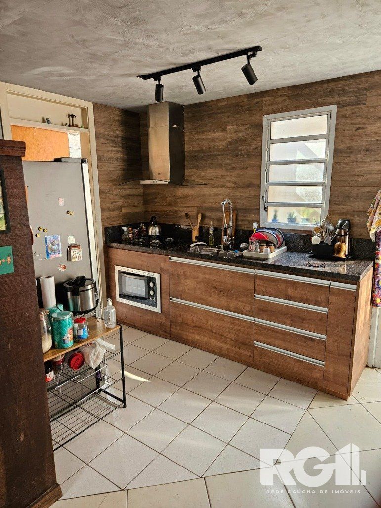Casa de Condomínio à venda com 3 quartos, 84m², 1 suíte, 1 vaga, Rua Tenente Ary Tarrago no bairro Jardim Itu em Porto Alegre