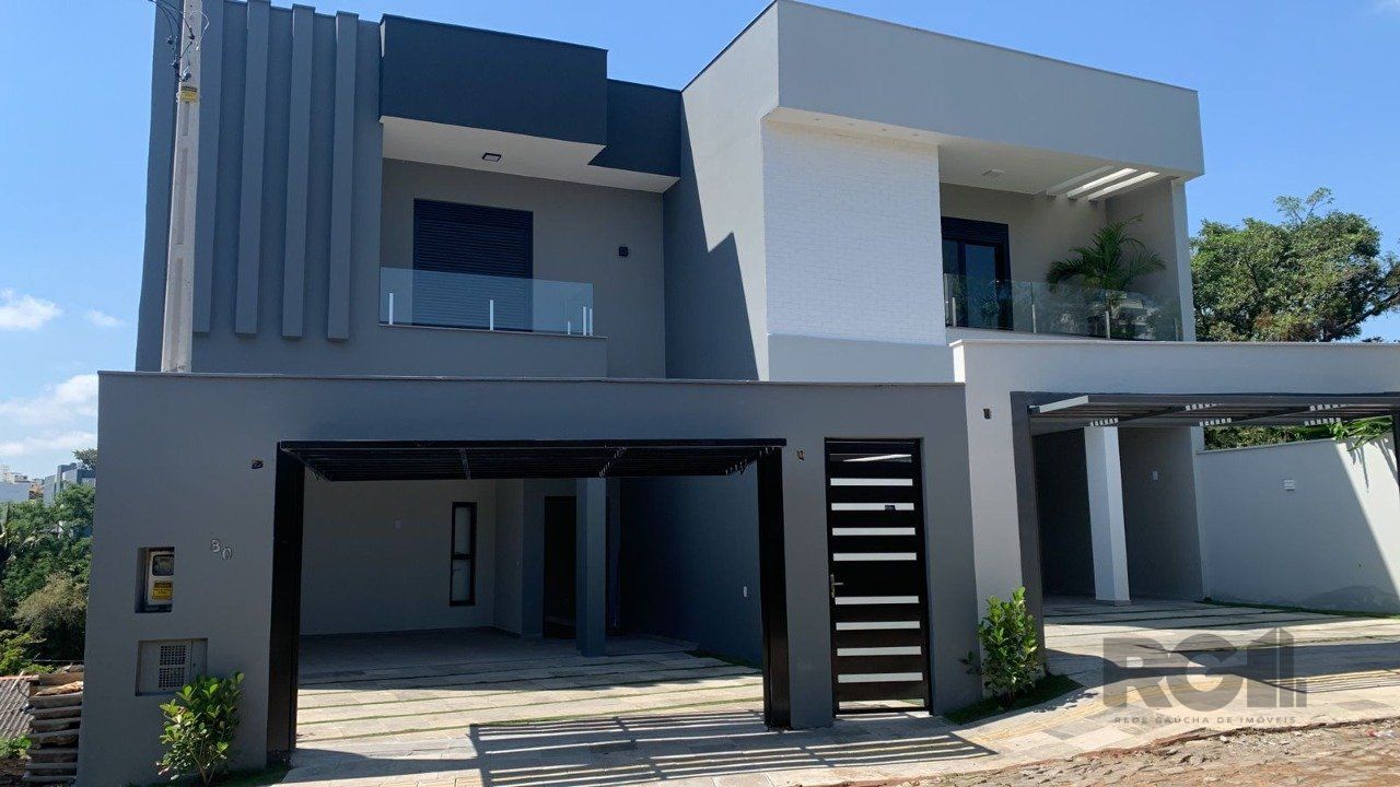 Casa à venda com 3 quartos, 232m² - Foto 1