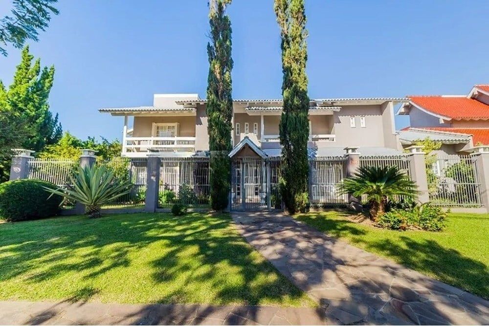 Casa à venda com 4 quartos, 391m² - Foto 1