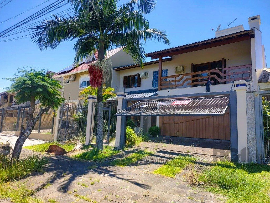 Casa à venda com 3 quartos, 276m² - Foto 1