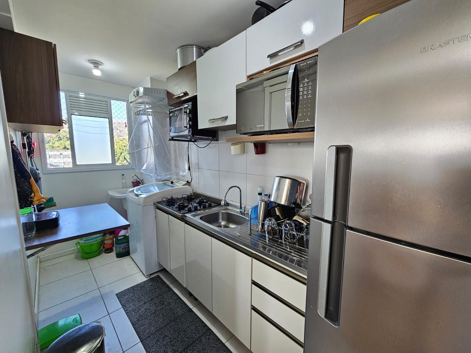 Apartamento 2 dormitórios com vaga e elevador perto da PUC