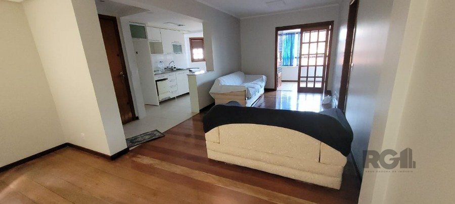 Apartamento de 2 dormitórios grande com suite, sacada fechada com churrasqueira, elevador, garagem, no Bairro São João / Higienópolis
