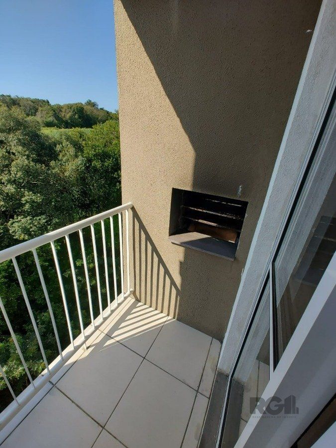 Apartamento à venda com 51m², 2 quartos, 1 vaga no bairro Vila Nova em Porto Alegre