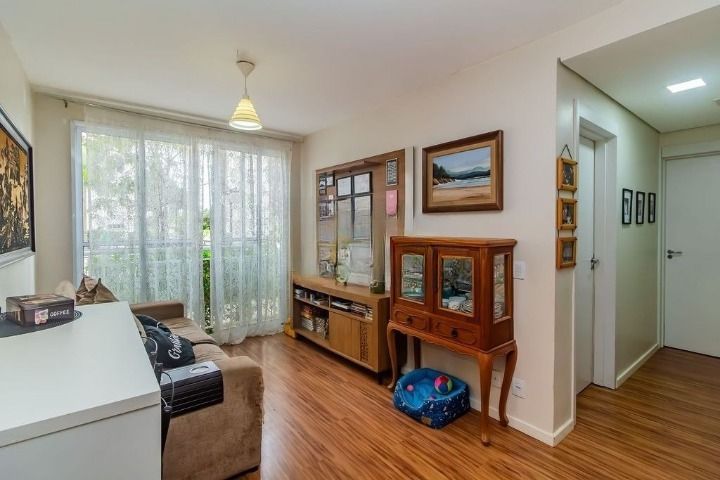 Apartamento à venda com 57m², 2 quartos, 1 suíte, 1 vaga no bairro Vila Nova em Porto Alegre