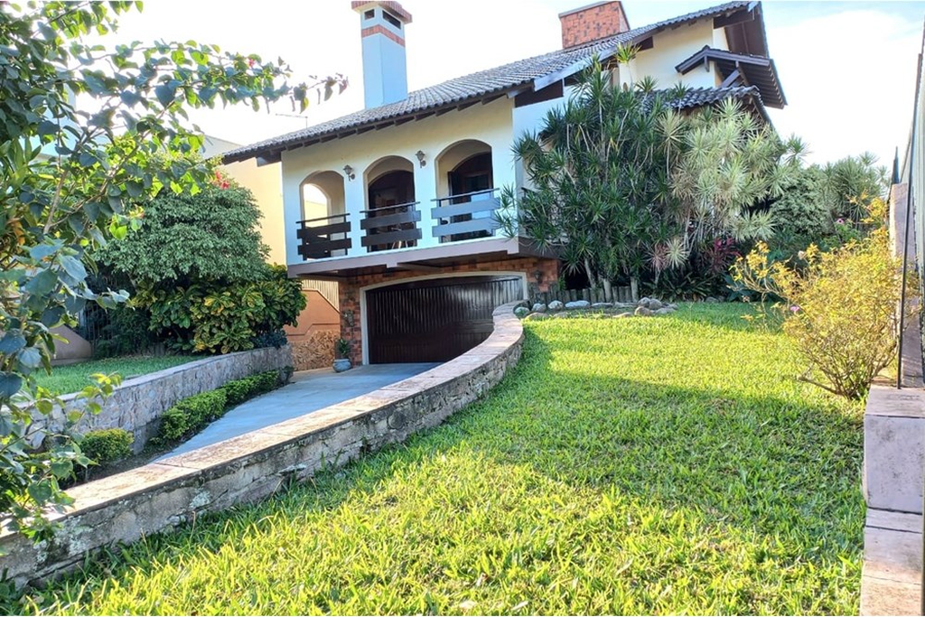 Casa à venda com 4 quartos, 321m² - Foto 1