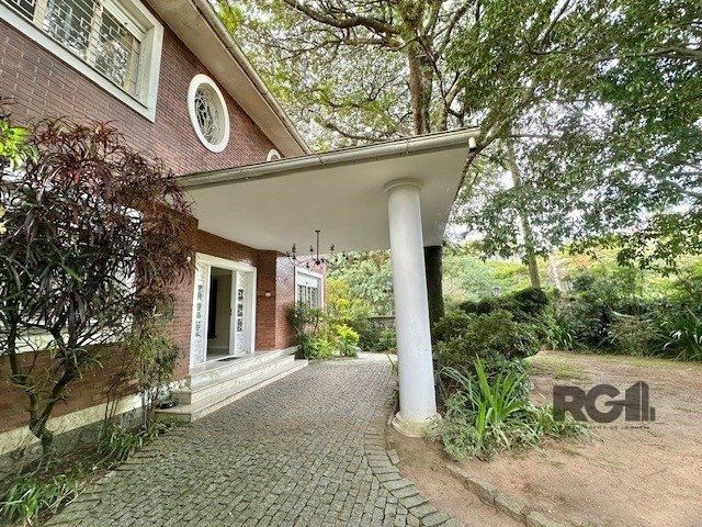 Casa para alugar com 5 quartos, 721m² - Foto 1