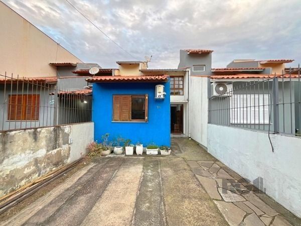 Casa à venda com 63m², 2 quartos, 1 vaga no bairro Hípica em Porto Alegre