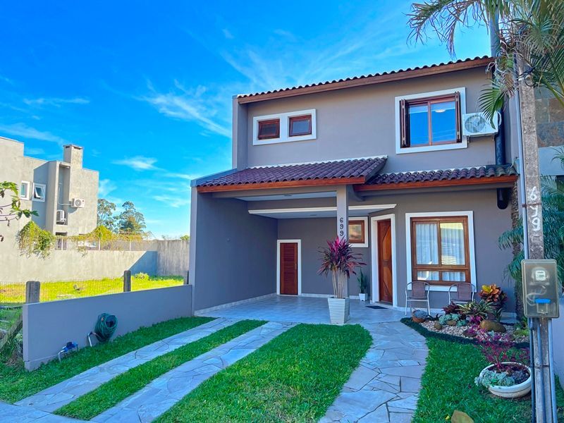 Casa à venda com 3 quartos, 134m² - Foto 1