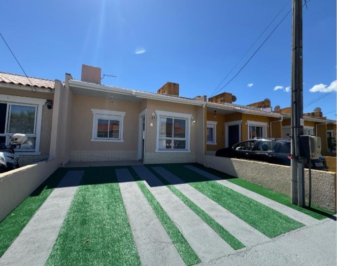 Carrara- Casa térrea 2 dormitórios, reformada , com 2 vagas , churrasqueira