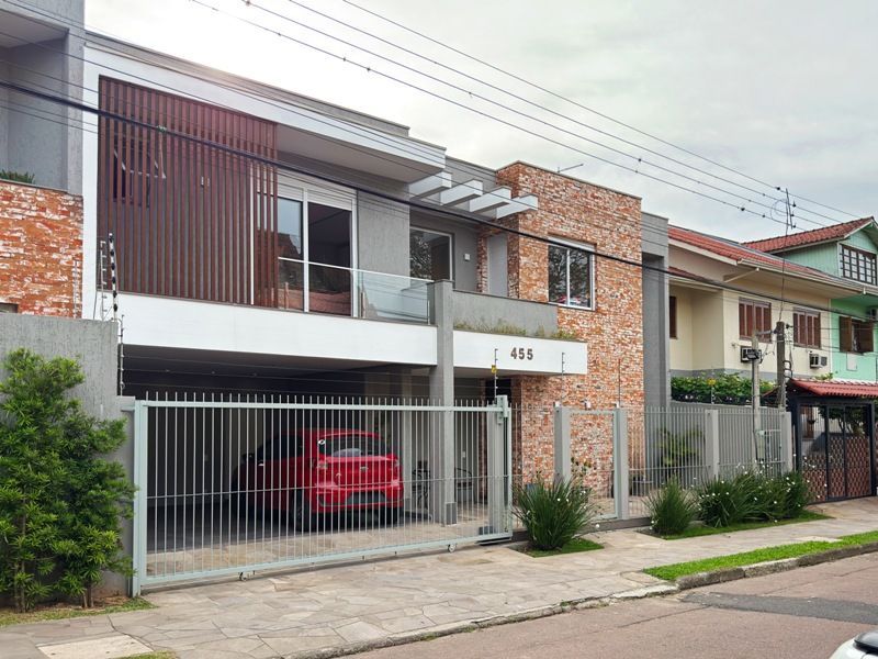 Casa 4 dormitórios no bairro Camaquã