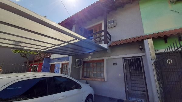 Casa à venda com 73m², 2 quartos, 1 vaga no bairro Hípica em Porto Alegre