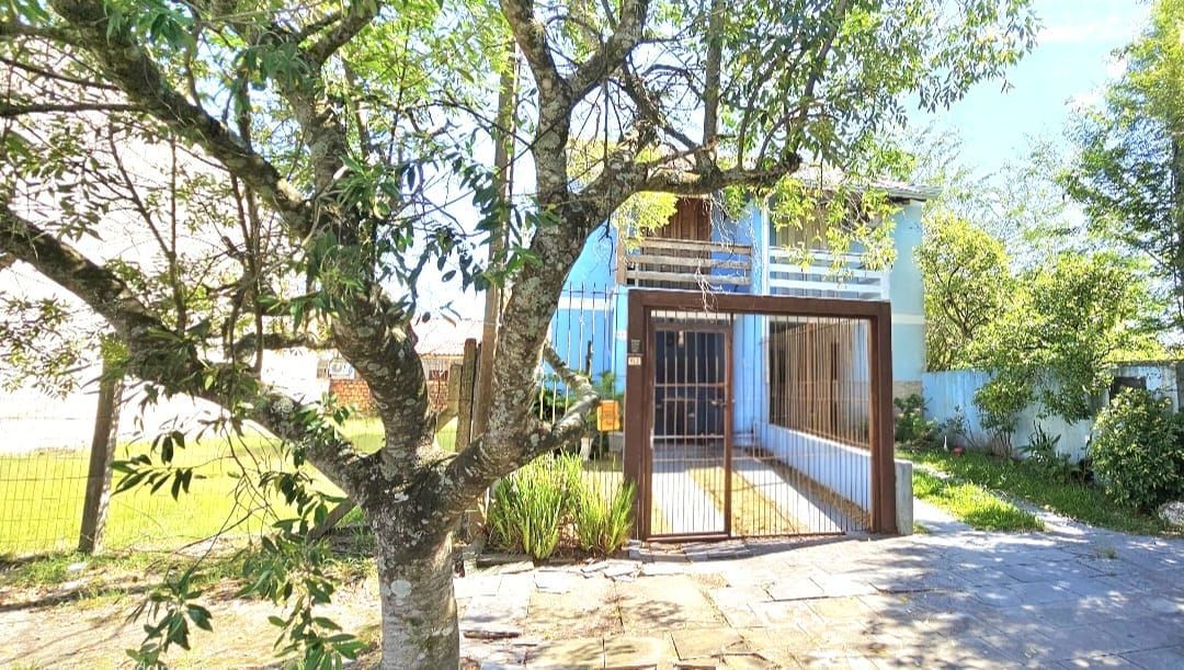 Casa à venda com 77m², 2 quartos, 2 vagas no bairro Hípica em Porto Alegre