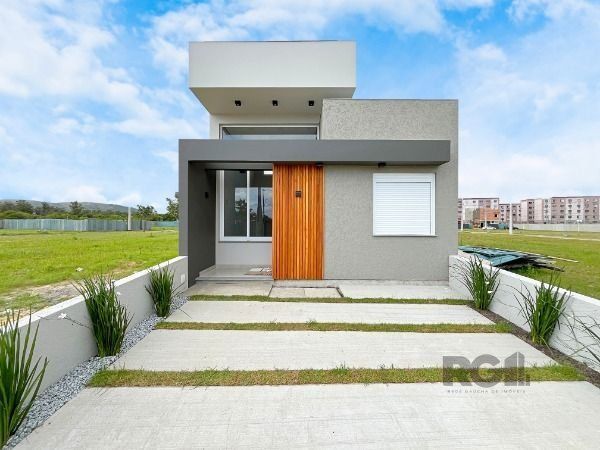 Casa de Condomínio à venda com 83m², 3 quartos, 1 suíte, 1 vaga no bairro Hípica em Porto Alegre