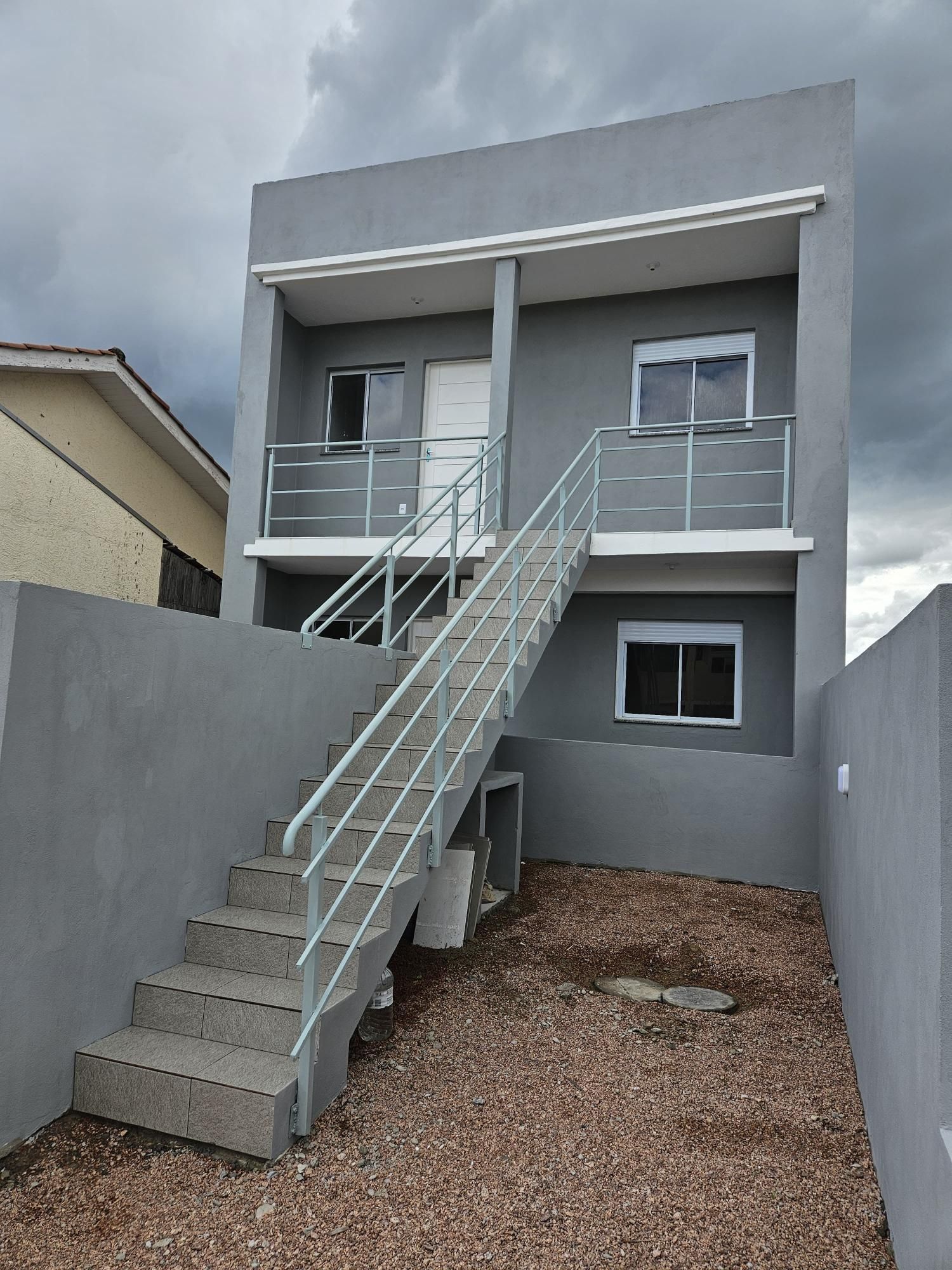 Apartamento à venda com 55m², 2 quartos, 1 vaga no bairro Restinga em Porto Alegre