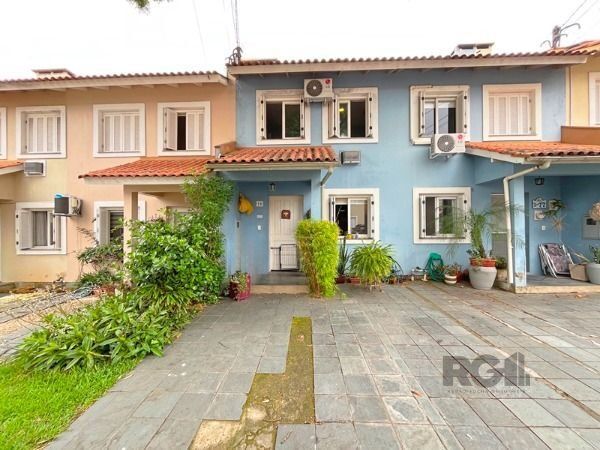 Casa em Porto Alegre, no bairro Cavalhada, com 2 dormitório(s), e 2 banheiros, à venda.