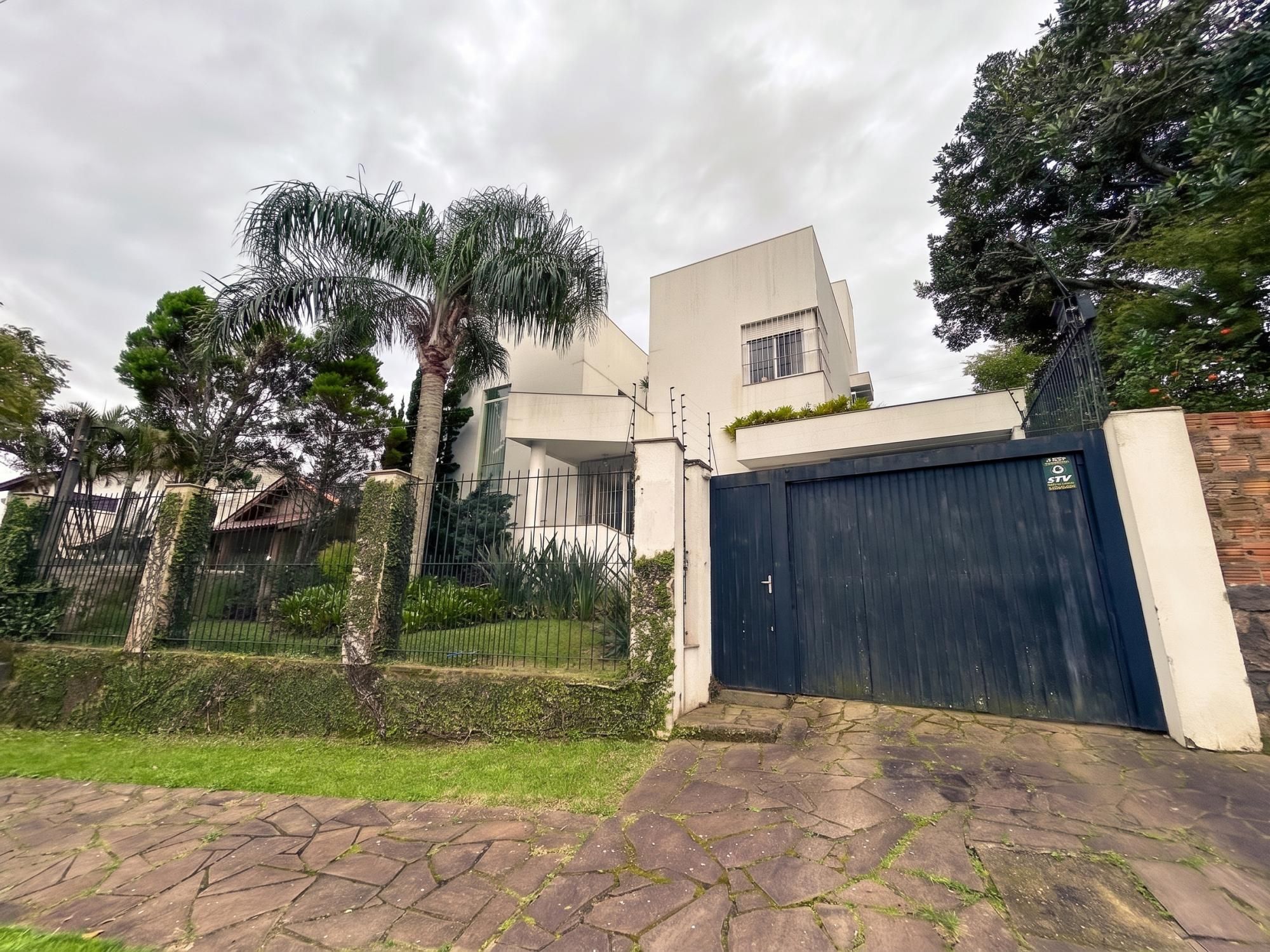 Casa em Porto Alegre, no bairro Espírito Santo, com 3 dormitório(s), e 3 banheiros, à venda. — foto 2