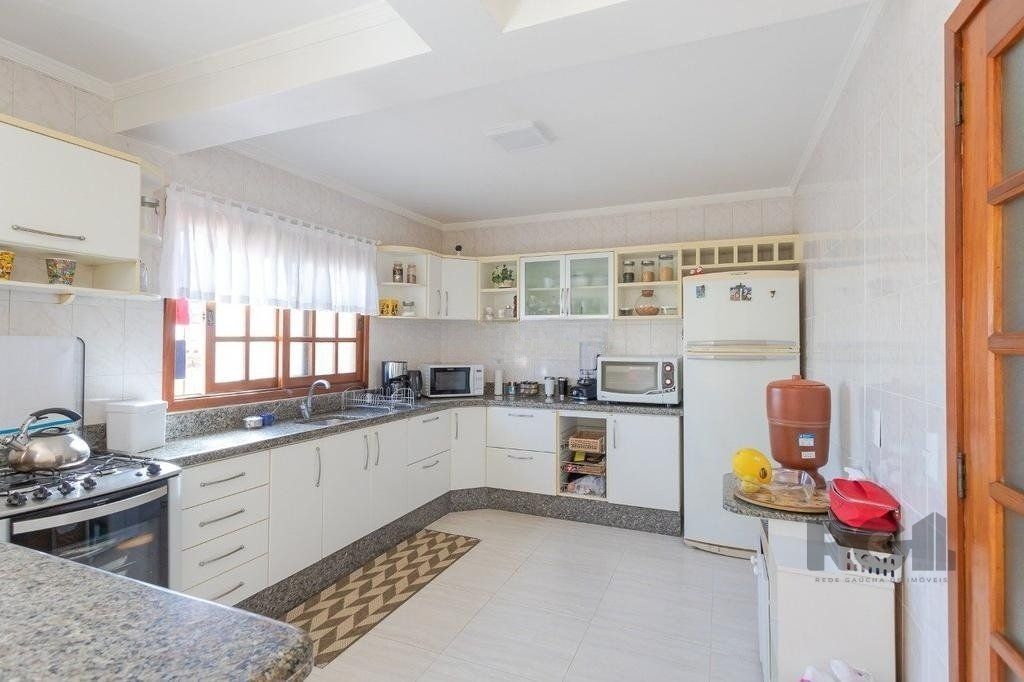 Casa à venda com 4 quartos, 229m² - Foto 7