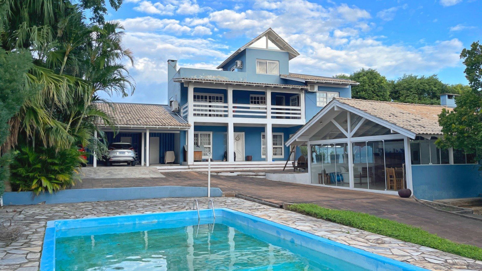 Casa de 5 dormitorios, á venda no bairro Vila Nova, Porto Alegre