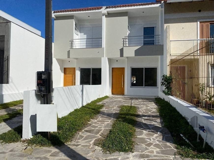 Casa à venda com 3 quartos, 127m² - Foto 1