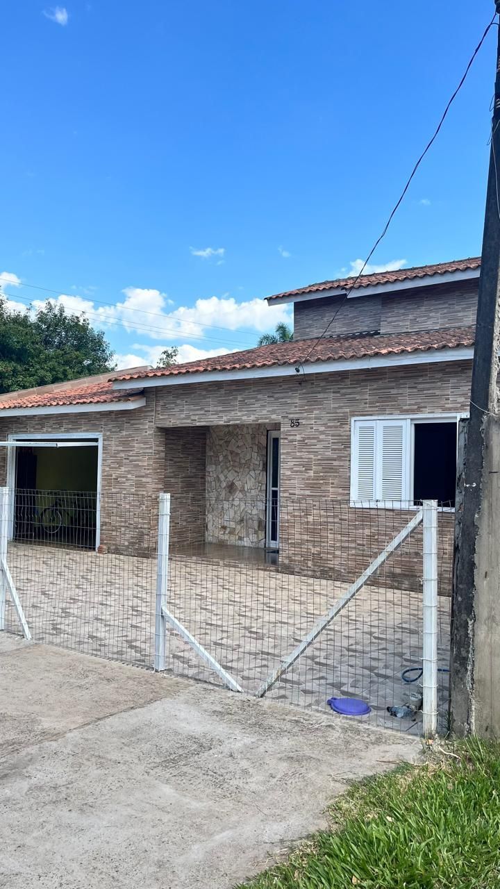 Casa 2 dormitórios, 2 vagas, Bairro Marechal Rondon — foto 2