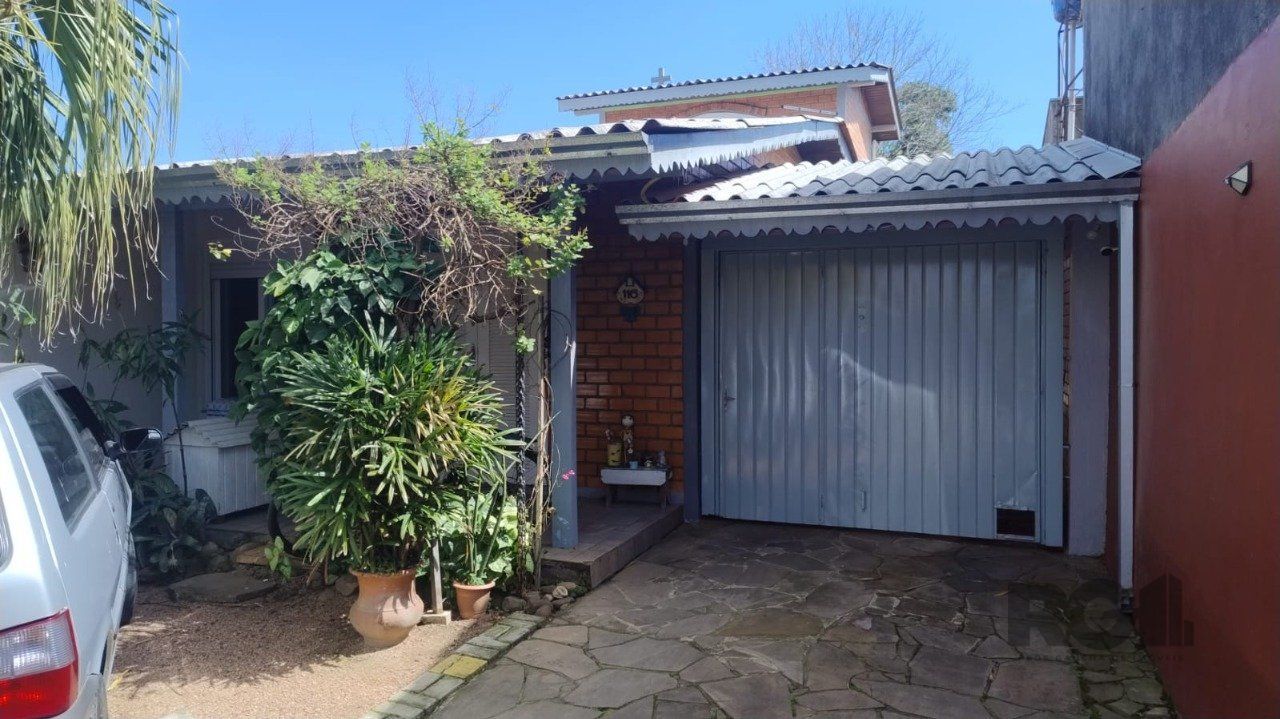 Casa 3 dormitórios, 1 suíte, 4 vagas Bairro Monte Carlo — foto 2