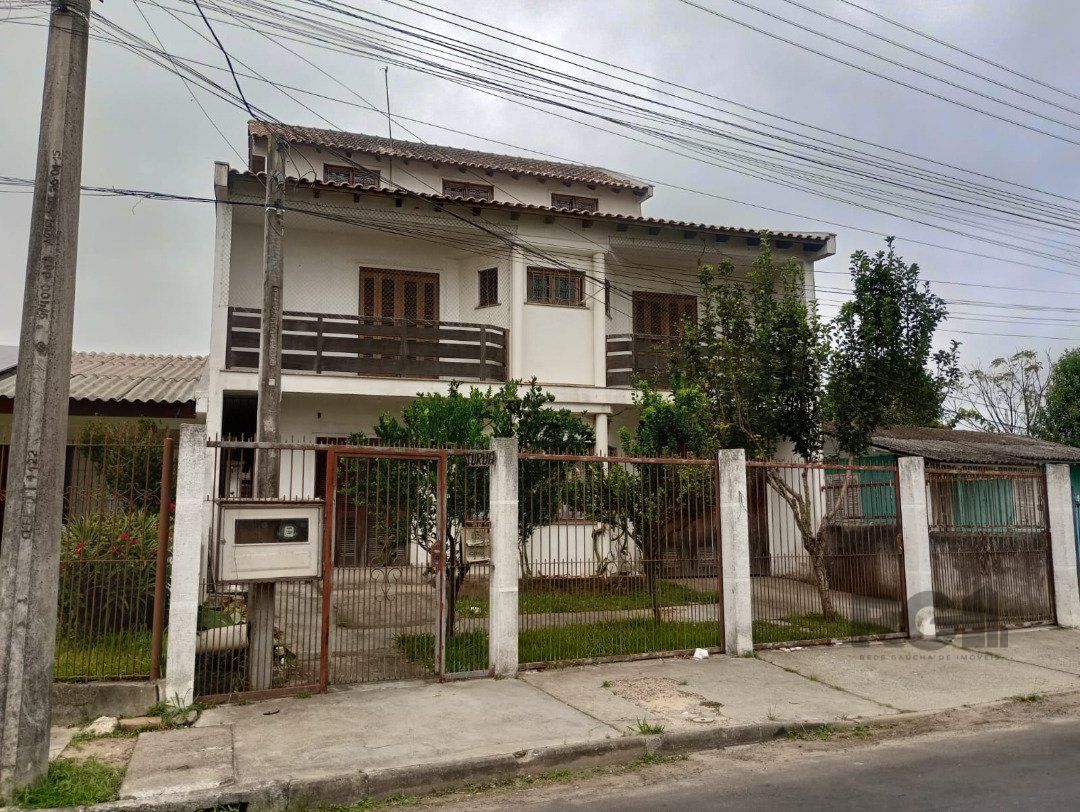 Casa à venda com 5 quartos, 252m² - Foto 1