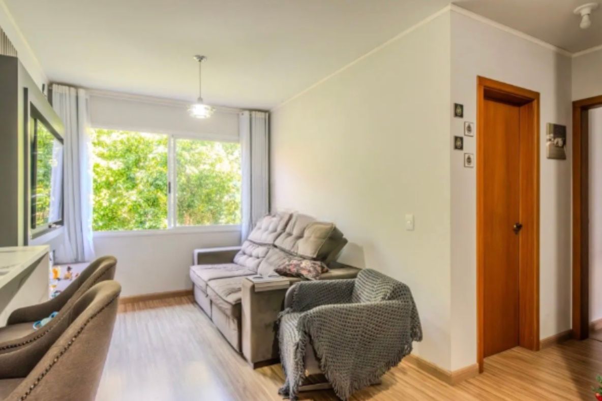 Apartamento à venda com 57m², 2 quartos, 1 vaga no bairro Santa Tereza em Porto Alegre
