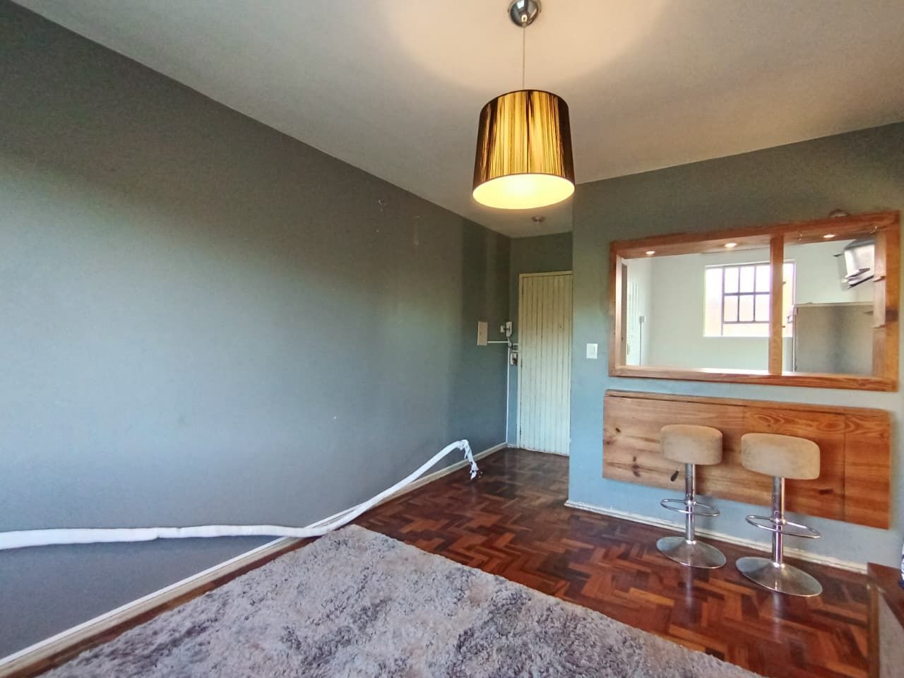 Apartamento de dois dormitórios á venda no bairro Cristal em Porto Alegre.