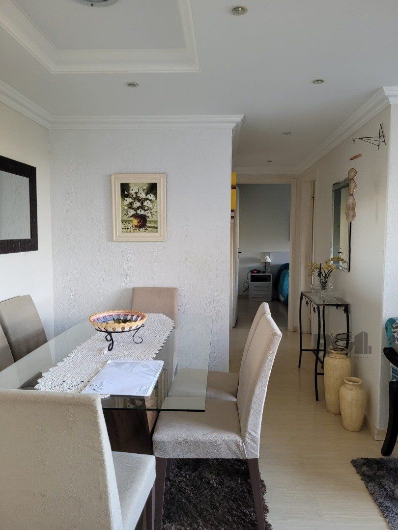 Apartamento à venda com 61m², 2 quartos, 1 vaga no bairro Cavalhada em Porto Alegre