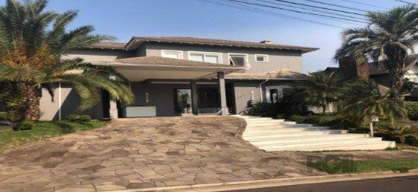 Casa de Condomínio à venda com 4 quartos, 303m² - Foto 1