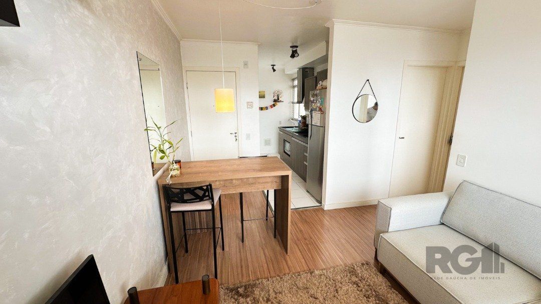 Apartamento à venda com 40m², 2 quartos, 1 vaga no bairro Cavalhada em Porto Alegre