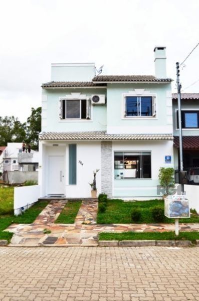 Casa à venda com 140m², 3 quartos, 1 suíte, 1 vaga no bairro Hípica em Porto Alegre