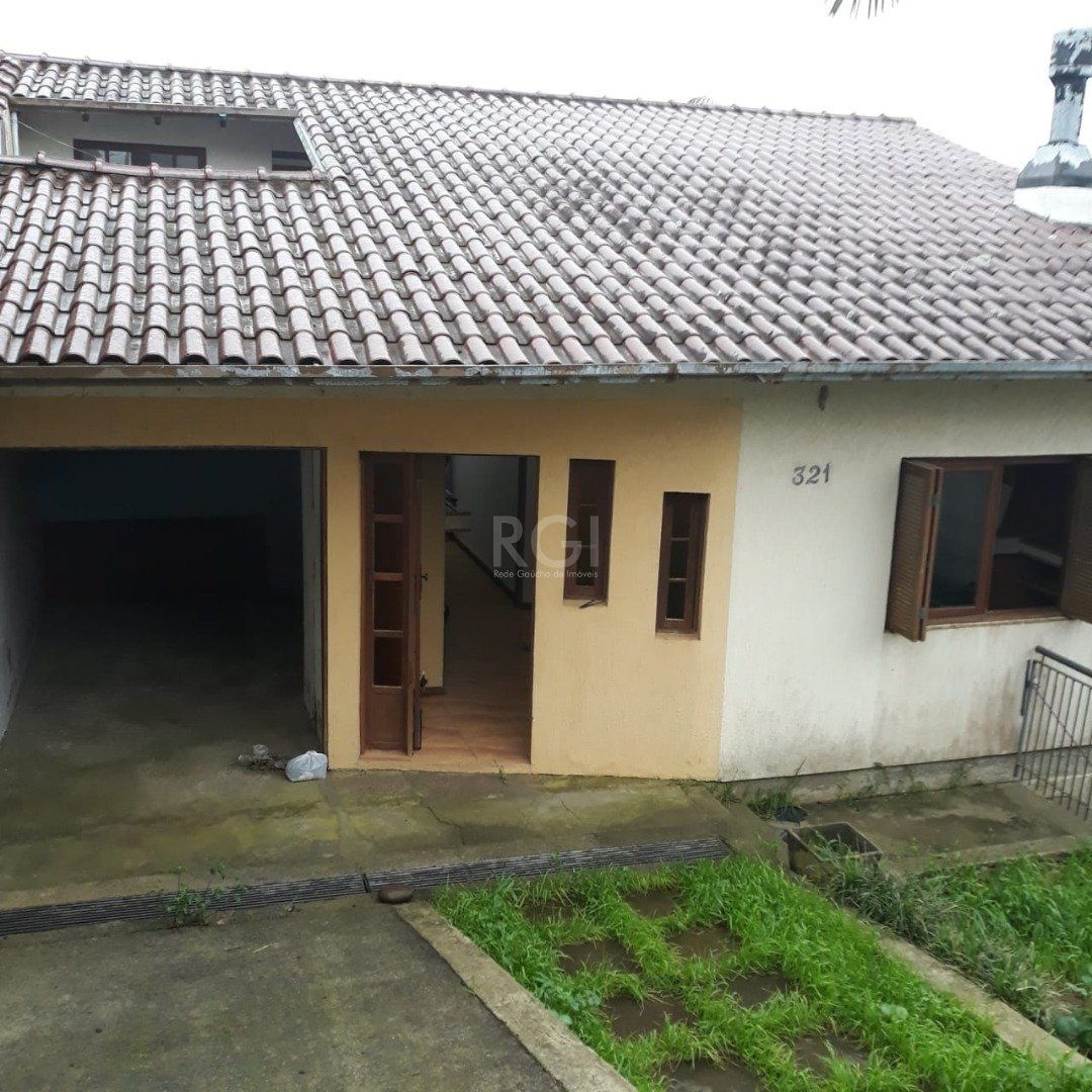 Casa à venda com 3 quartos, 176m² - Foto 1