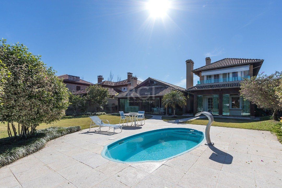 Casa de Condomínio à venda com 3 quartos, 449m² - Foto 1