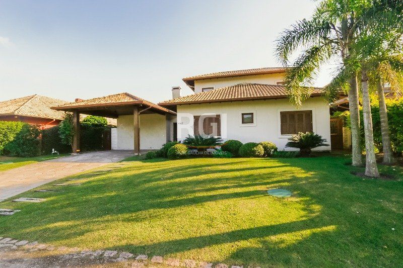 Casa de Condomínio à venda com 4 quartos, 322m² - Foto 1