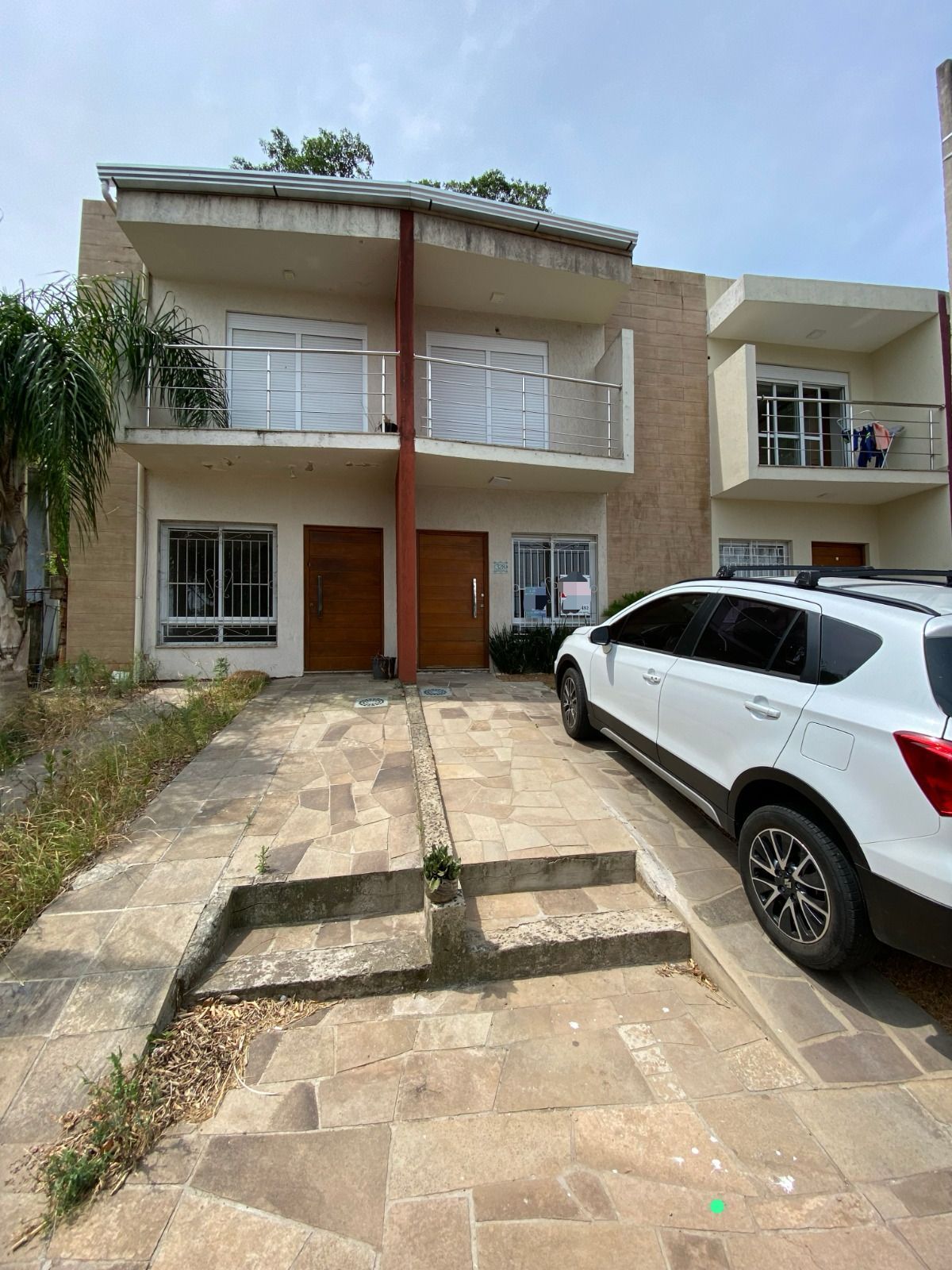 Sobrado com 2 Suítes, Sacada e Pátio com Teto Retrátil