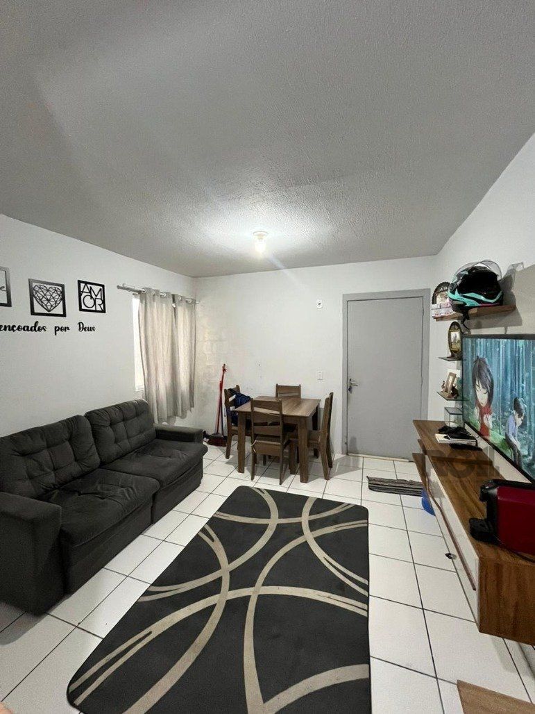 Apartamento à venda com 53m², 2 quartos, 1 vaga no bairro Restinga em Porto Alegre