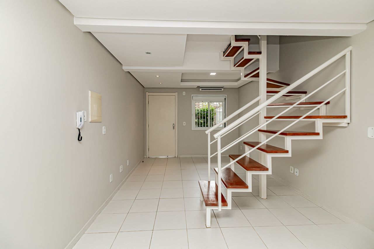 Casa de Condomínio 3 dormitórios no bairro Cavalhada